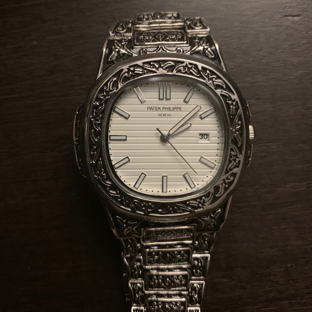Patek Philippe Nautilus 5990  (Hand Carved)